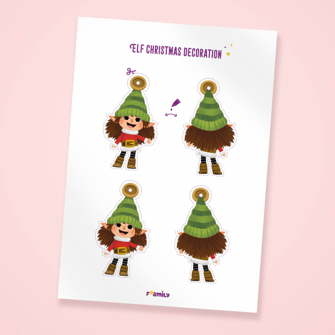 Ein bedruckbarer Bogen auf rosa Hintergrund zeigt eine Elfe in Vorder- und Rückansicht, mit gestrichelten Linien zum Ausschneiden und einem Loch zum Aufhängen, beschriftet mit Elf Christmas Decoration. Perfekt als DIY Weihnachtsschmuck.